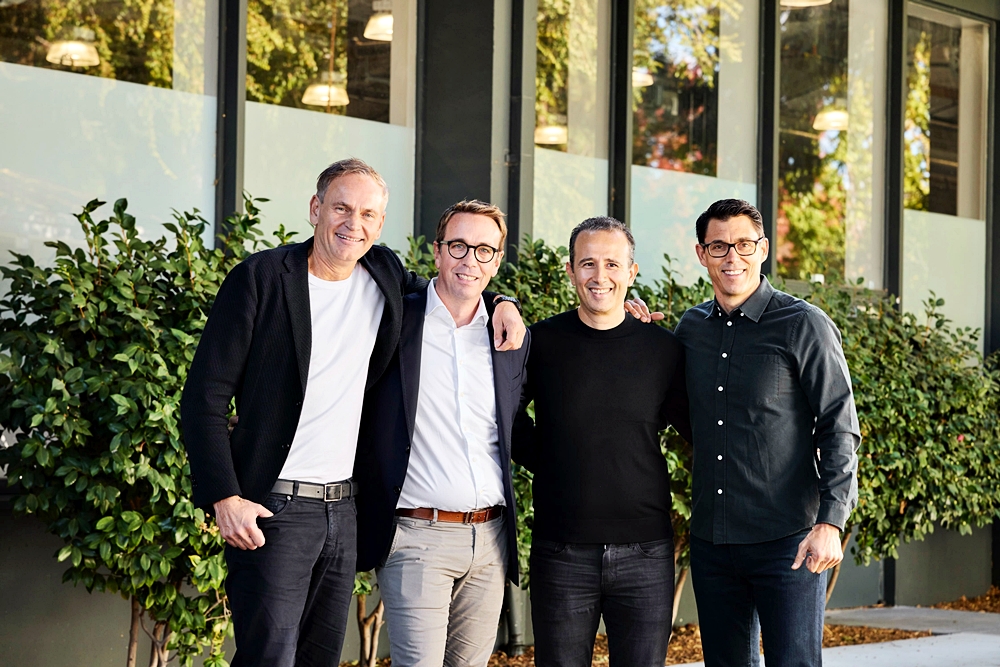 Oliver Blume, CEO Volkswagen Group, Carsten Helbing, designated future co-CEO of the joint venture, Wassym Bensaid, co-CEO of the joint venture, RJ Scaringe, Founder and CEO of Rivian